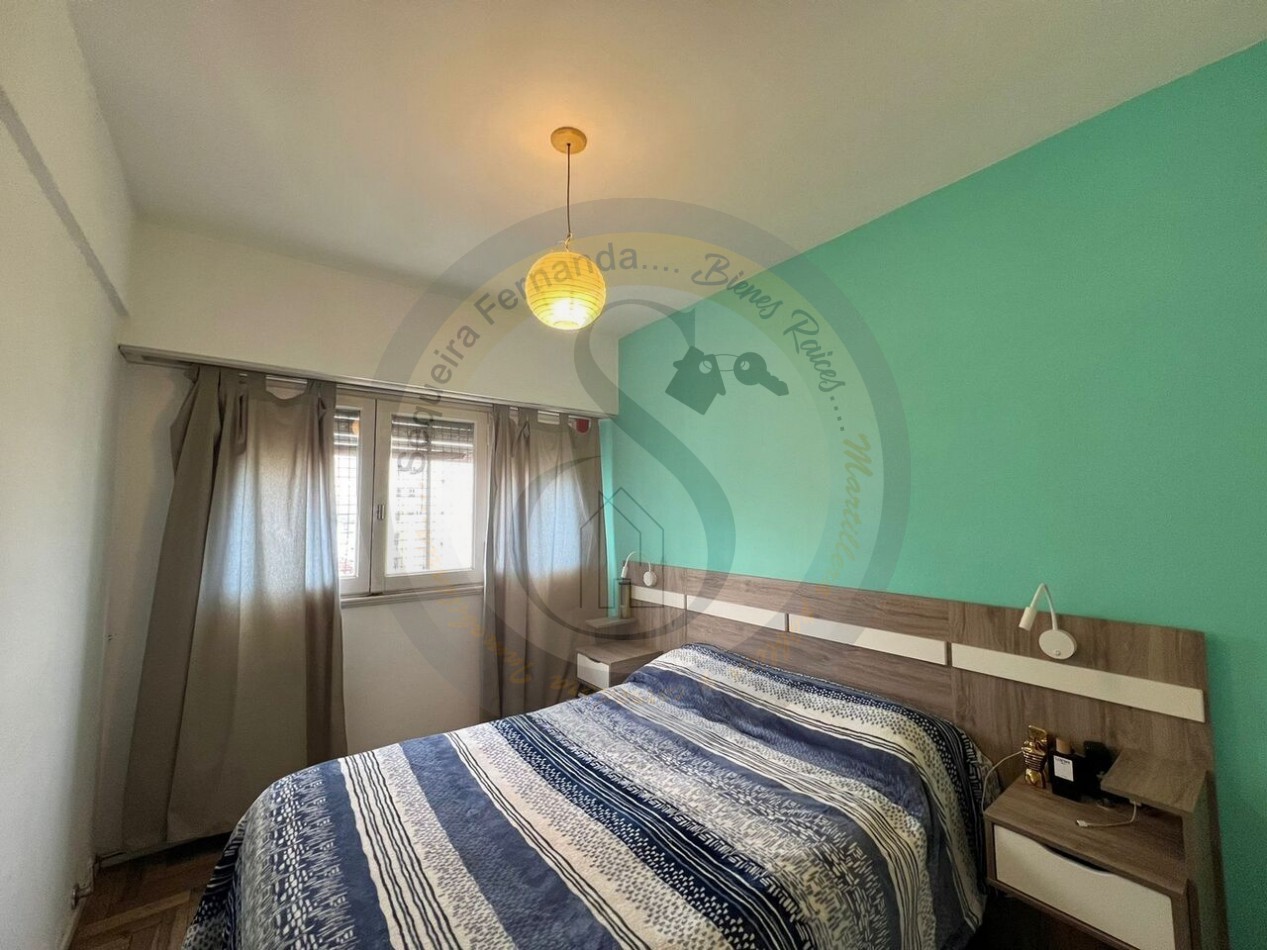 Departamento 3 ambientes con balcon hacia la calle mas quincho salon comedor