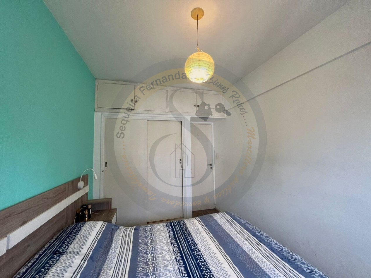 Departamento 3 ambientes con balcon hacia la calle mas quincho salon comedor