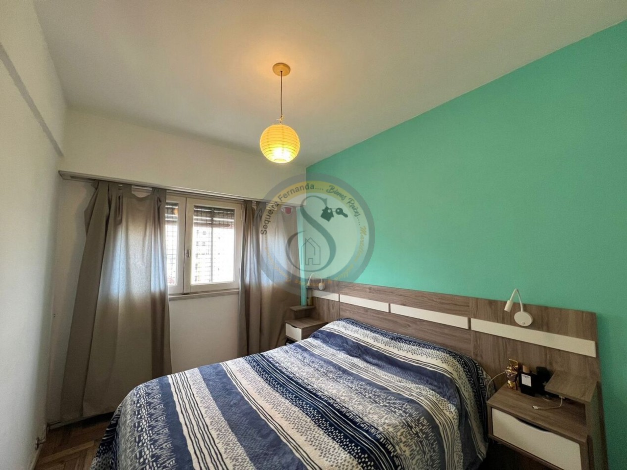Departamento 3 ambientes con balcon hacia la calle mas quincho salon comedor